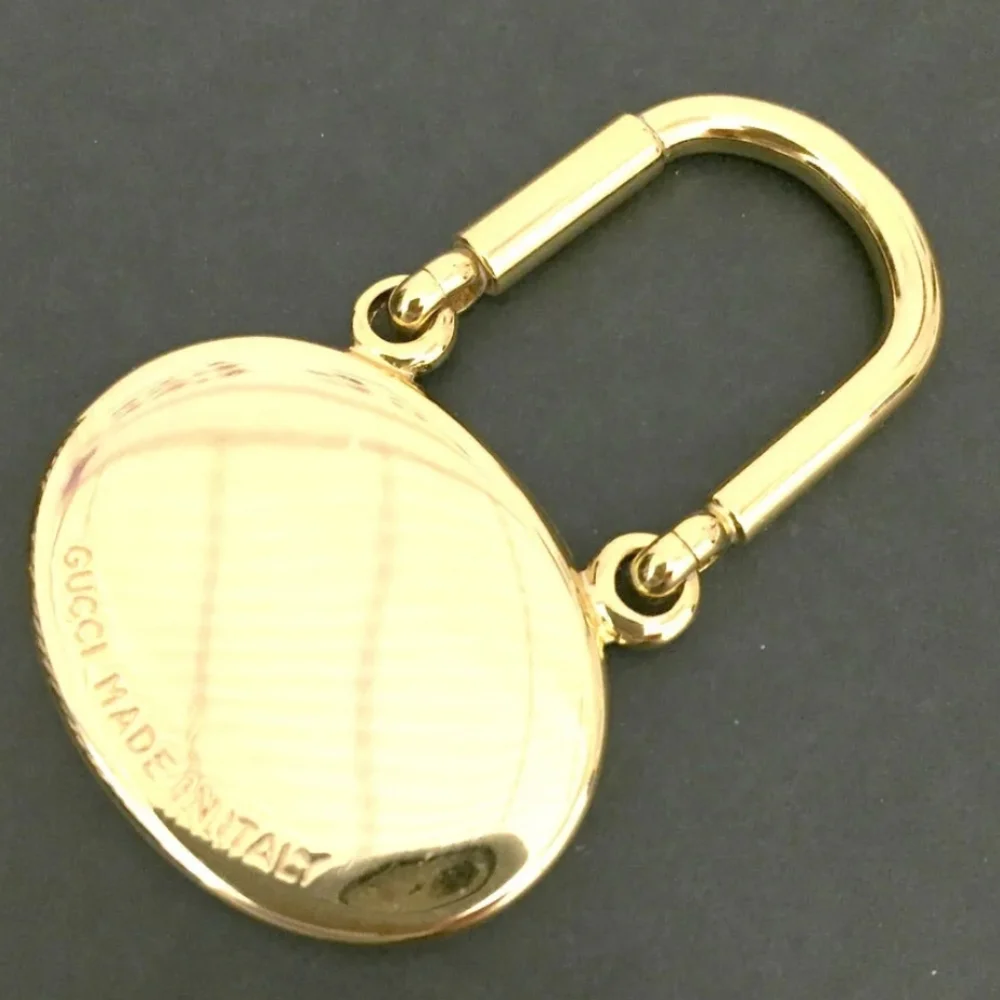 GUCCI INTERLOCKING G SILVER GOLD TONE KEY RING CHARM/UT1930 (UNISEX).